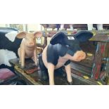 Two fibreglass models of Piglets.