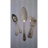 A pair of Art Nouveau silver plated spoons together with six pastry forks and a cake slice.