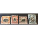 North Borneo, 4 mint stamps, SG165, 174, 176 and 179. Cat. £88.
