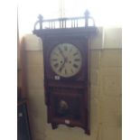 A late 19th century oak cased regulator wall clock.