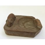 Robert Thompson: A Mouseman carved oak ashtray with carved mouse decoration.