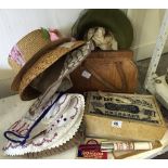 A ladies' snakeskin handbag in original box together with a collection of various dress hats and