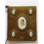 A French brass desk blotter with five hand painted Sevres style porcelain oval pannels with gilt