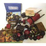 Quantity of Meccano parts, includes wheels, brass gears, clockwork motor, part-built car,