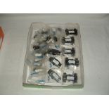 A tray containing new SCALEXTRIC spares - 5 x Motors for Micro Cars with chassis guide, wheels,