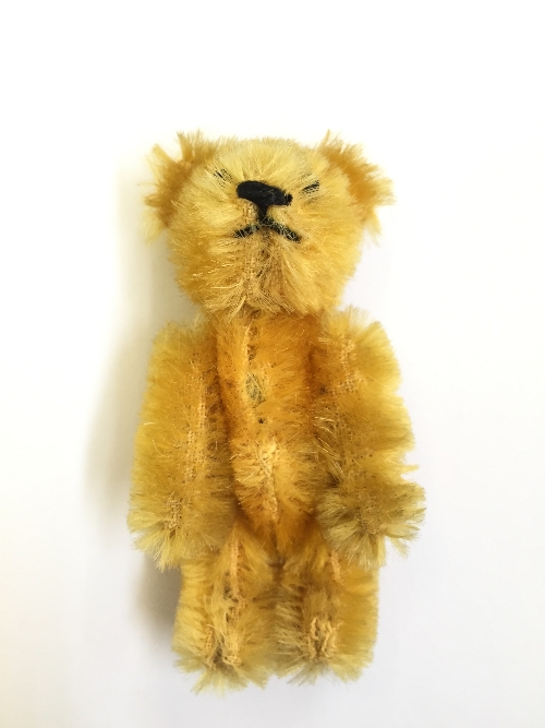 Miniature Schuco Teddy Bear: golden mohair, boot button eyes, stitched nose and mouth, metal frame. - Image 2 of 2
