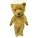 Chiltern (England) Musical Teddy Bear: plastic nose, stitched mouth, velveteen pads, label to side.