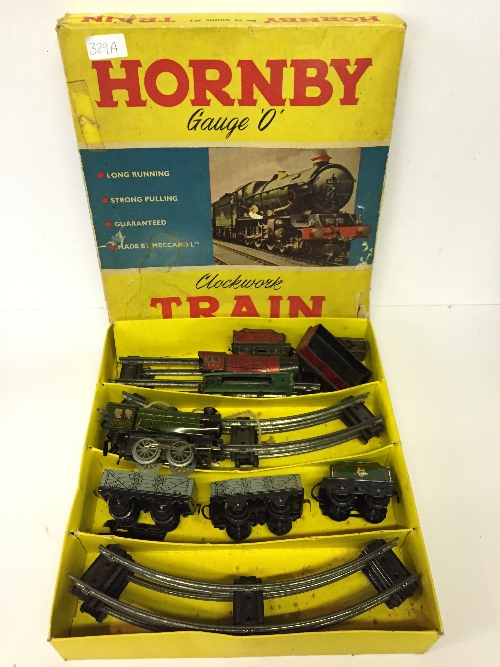 Hornby MO Gauge No.20 Goods Set, comprising: 0-4-0 clockwork tender locomotive; 2 x goods wagons;