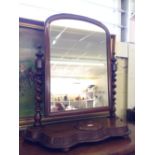 A large late 19th century mahogany framed dressing chest mirror resting on polished barley twist