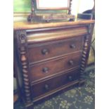 A late 19th century four drawer Scottish mahogany chest of drawers with barley twist mounts to