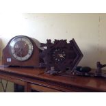 A Westminster Chime oak cased mantle clock together with a cuckoo clock.