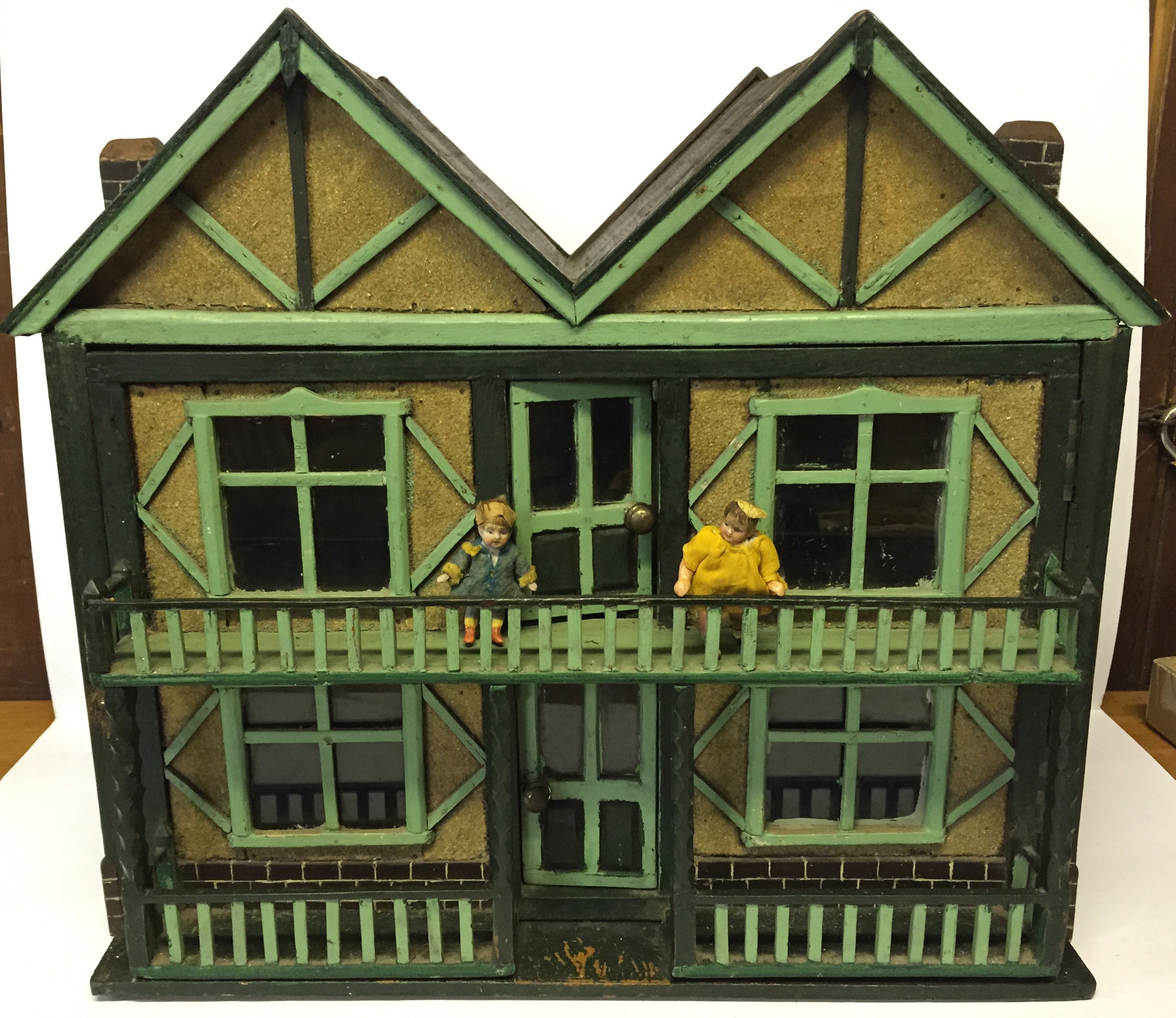 Tudor style doll's house, built by a professional cabinet maker, with veranda and balcony,