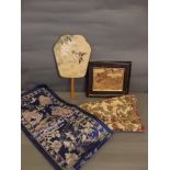 Three Oriental embroideries, and a fan decorated with a bird, 15'' long