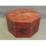 An octagonal lacquer box painted with flowers, 5'' high