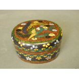 A Chinese cloisonné enamel trinket box with phoenix decoration on a gilt flecked ground, 3'' long