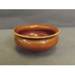 A Chinese brown glazed shallow porcelain bowl, 4'' diameter