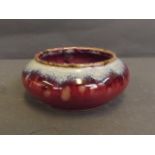 A C19th Chinese flambé glazed pottery bowl, 4½'' diameter