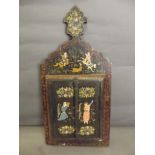 An Indian wooden painted mirror, the doors decorated with figures and flowers, 18½'' long