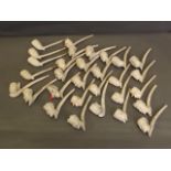 A large quantity of C19th clay pipes in the form of famous generals and royalty, 5'' long (some AF)