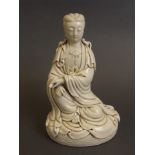 A Chinese blanc-de-chine figure of Quan Yin, impressed marks verso,