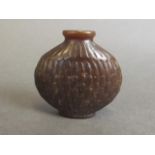 A Chinese brown jade snuff bottle with carved bamboo decoration,