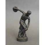 A C19th bronze figure in the form of a discus thrower,