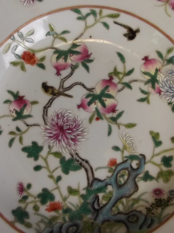 A Chinese porcelain dish with painted enamel decoration of a pomegranate tree, - Image 2 of 4