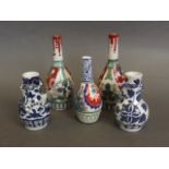 Five small Oriental porcelain spill vases,