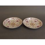 A pair of Chinese famille rose enamel porcelain dishes with scrolling lotus flower decoration,