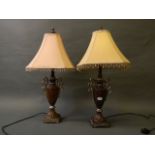 A pair of contemporary table lamps of classical form,