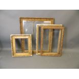 Four late C19th/early C20th gilt wood picture frames,