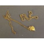 A 14ct gold twisted chain bracelet, and an 18ct gold heart shaped pendant on chain, 5g