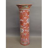 A Chinese iron red ground vase decorated with coloured flowers, 18'' high (AF)