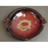 A Paul Metcalf Studio Pottery bowl with glazed knotted handles, 11½'' diameter