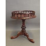 A miniature turned tripod table with a galleried top, 11'' x 9''