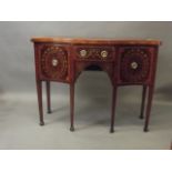 A good late C18th mahogany sideboard of small proportions with inlaid decoration and serpentine