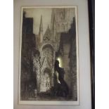 A framed etching of a church, signed Brewer, 21'' x 12''