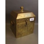 A late C19th/early C20th Chinese brass tea caddy with ring handles and all over engraved