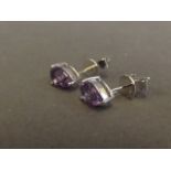 A pair of 9ct gold pear shaped amethyst ear studs