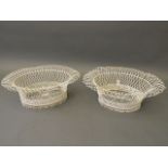 A pair of painted wire flower baskets, 18'' x 16½''