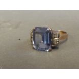 An Art Deco style yellow gold, diamond and blue topaz ring, size M