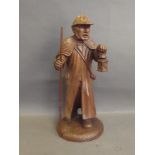 A Black Forest carving of a night watchman, 15½'' high