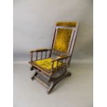 A late C19th American walnut rocking chair
