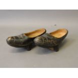 A pair of painted wood clogs, 12½'' long