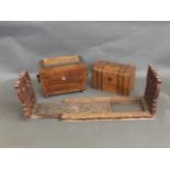 A Regency rosewood and amboyna inlaid sarcophagus shaped twin division tea caddy, with ring