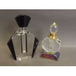 An Art Deco style black and clear glass scent bottle, and another smaller with a prism effect, 5''