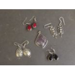 Four pairs of white metal drop earrings, and a polished hardstone pendant, 1½'' long