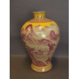 A Chinese Mei Ping yellow ground vase decorated with a mountain scene, 13'' high