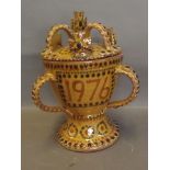 A Harry Juniper tyg in the form of a loving cup, signed and dated 'E. P.' 1976, 9½'' high