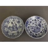 Two small Chinese blue and white porcelain dishes with petal shaped rims and painted decoration of